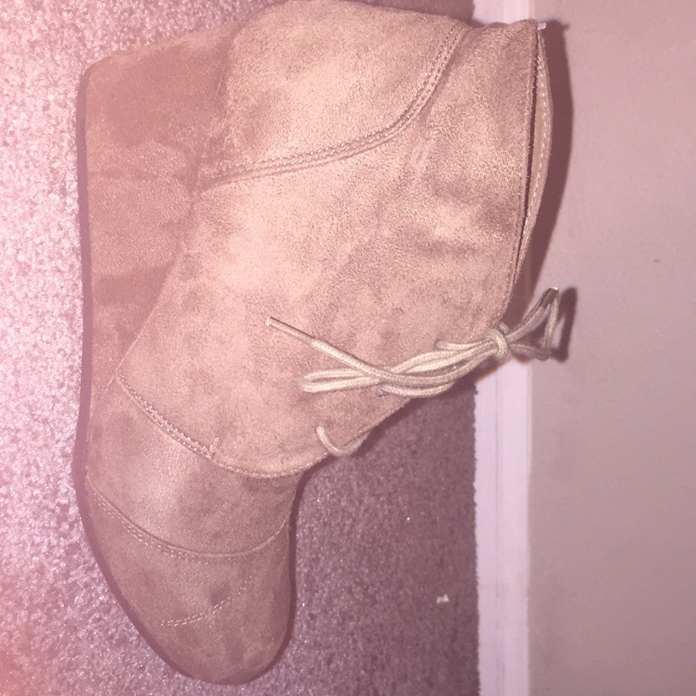 Wet seal wedged suede heels.